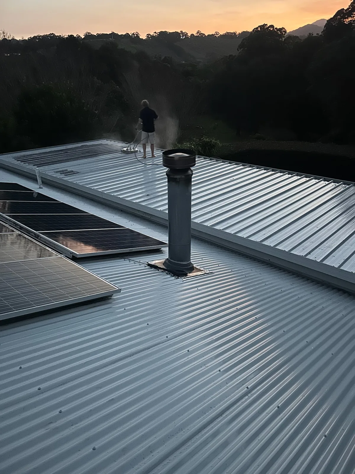 Roof cleaning in progress by KN Exteriors